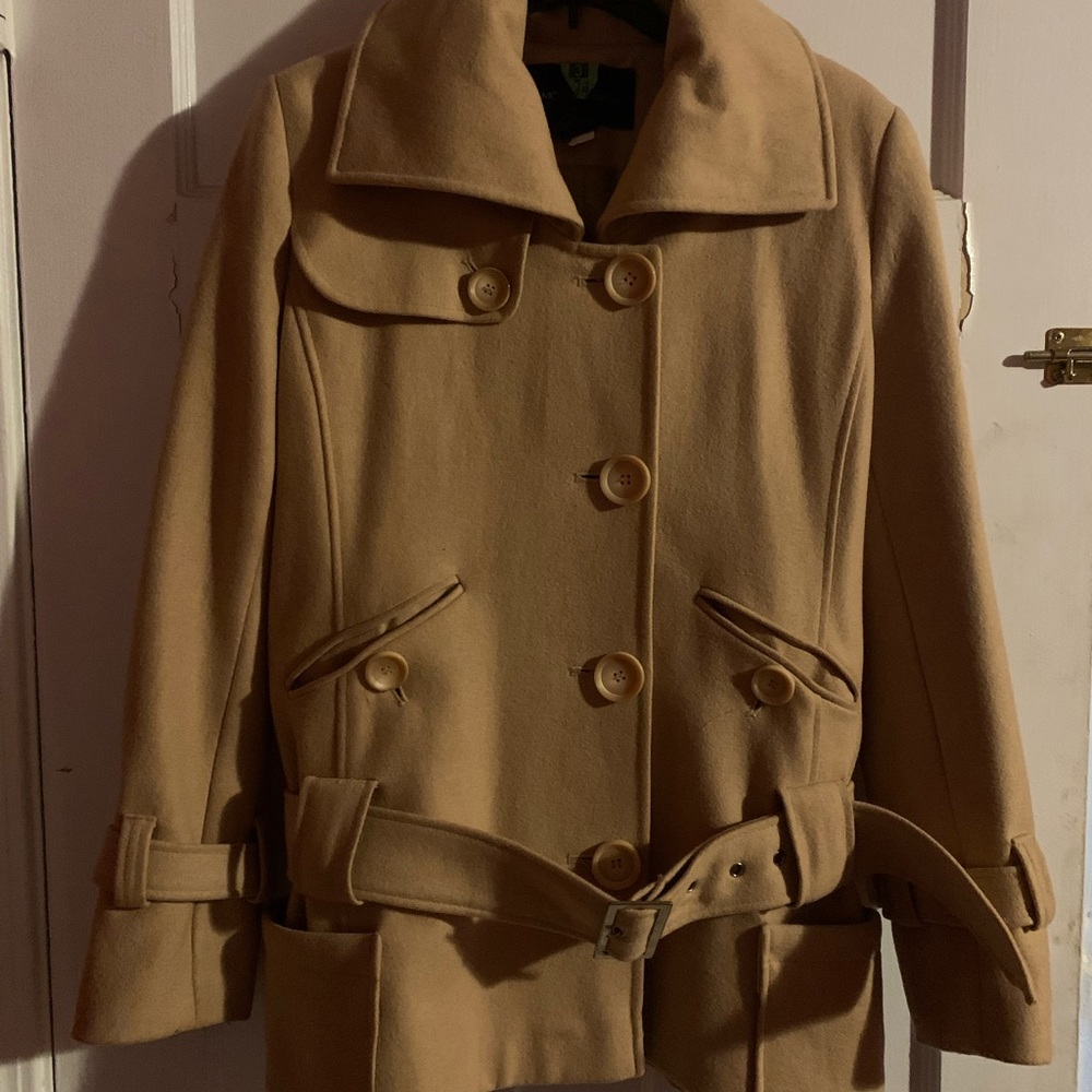 Size small tan/beige pea coat with belt in good condition no rips or stains.
